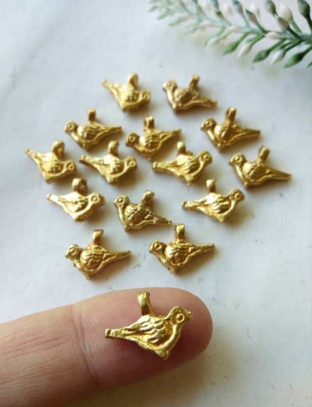 Bird charms – Handcrafted brass bird design.