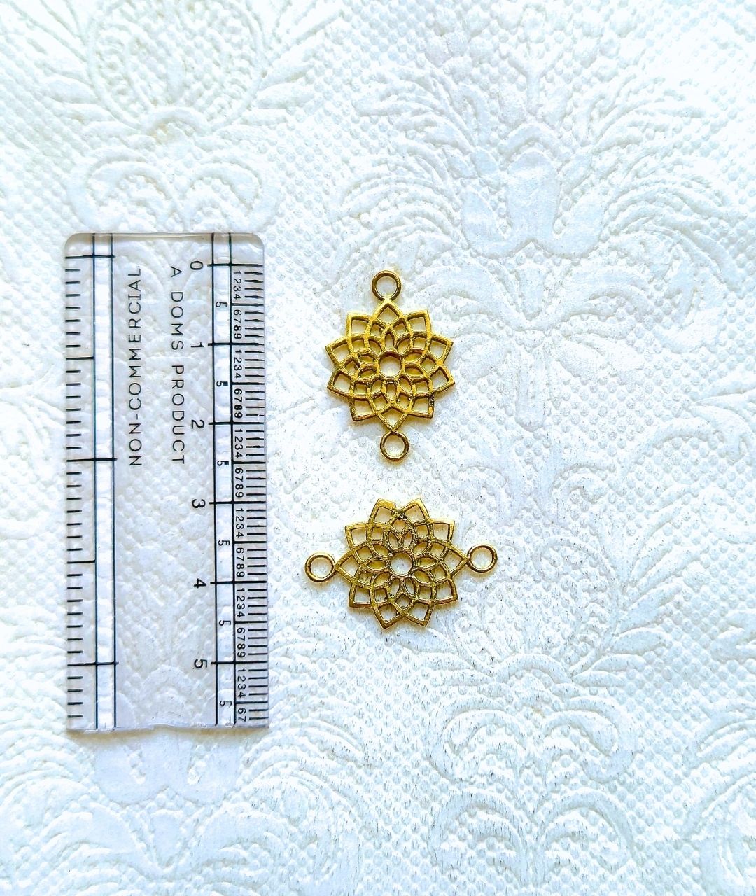 Mandala-style brass flower charm for macrame and jewelry